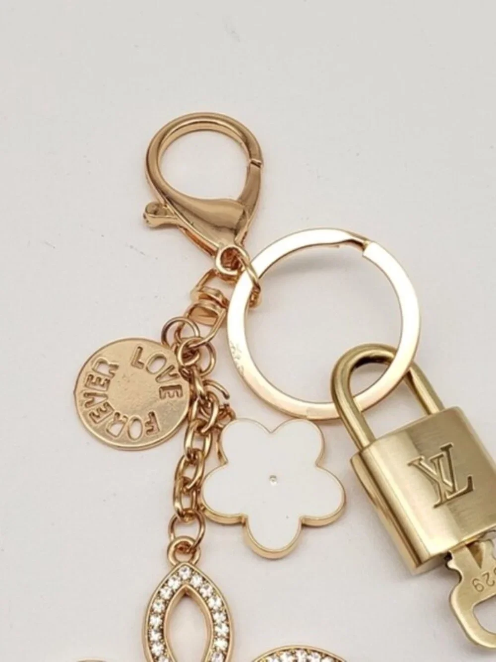 Authentic Louis Vuitton Gold Lock & Key 🔑 Bag Charm w/ Unbranded Clover Charm